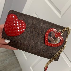 Michael Kors wallet on a chain